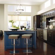 dark_wood_cabinets_blue_kitchen_island